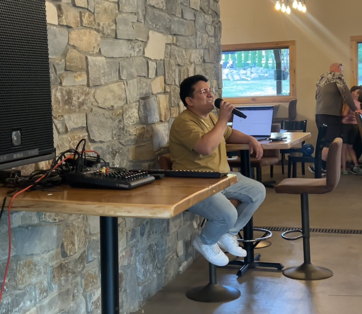 Guests singing karaoke on the patio at 14 Acres Vineyard & Winery