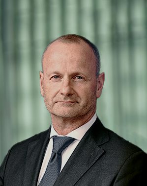 Steen Jakobsen, Chair of the Compensation Committee at Agilyx ASA, professional headshot in a dark suit