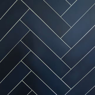 Dark navy herringbone tile flooring sample