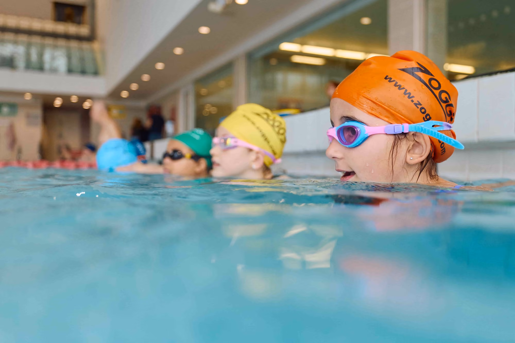 Children getting ready to swim.