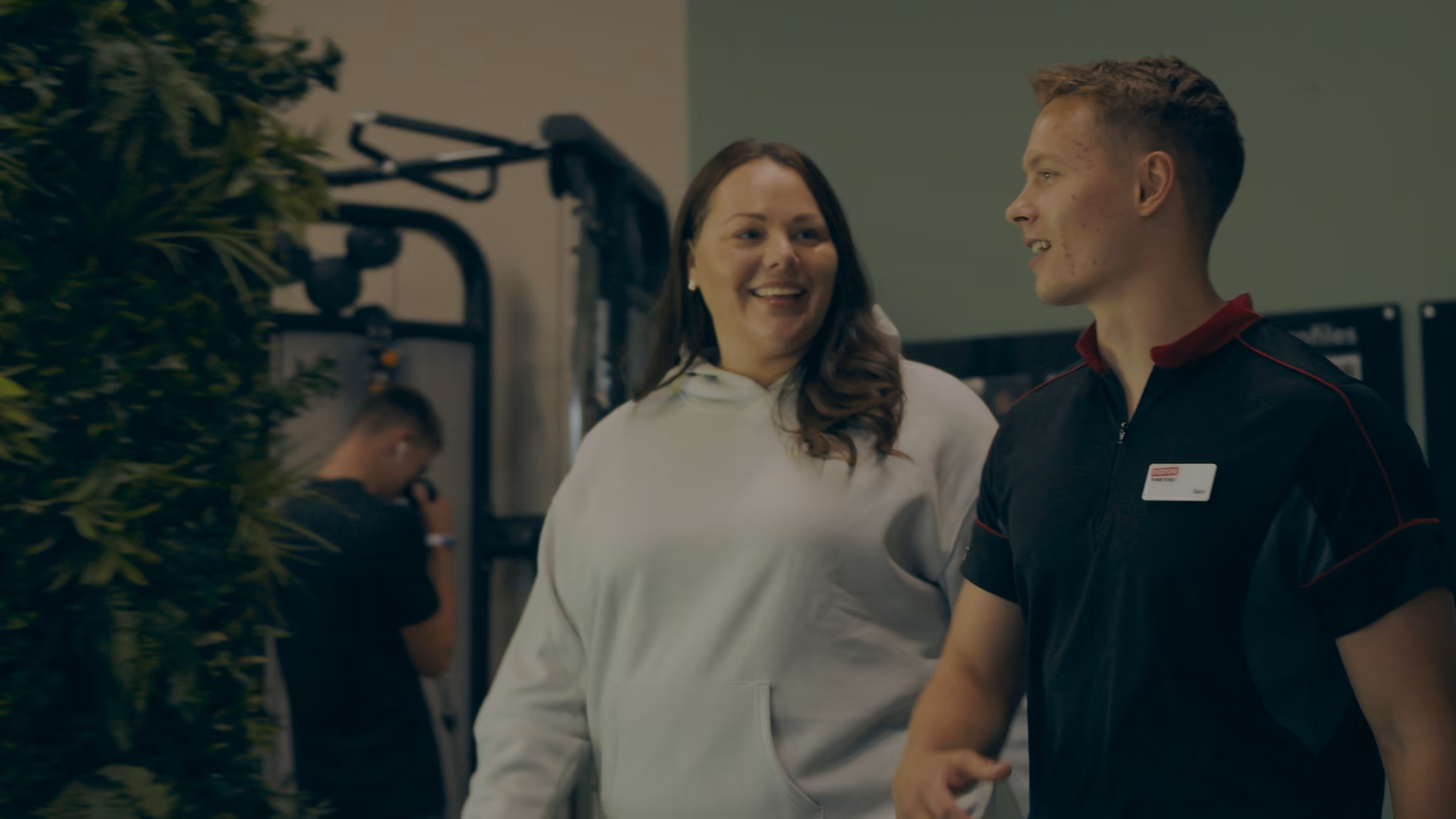 Woman speaking to Everyone Active trainer.
