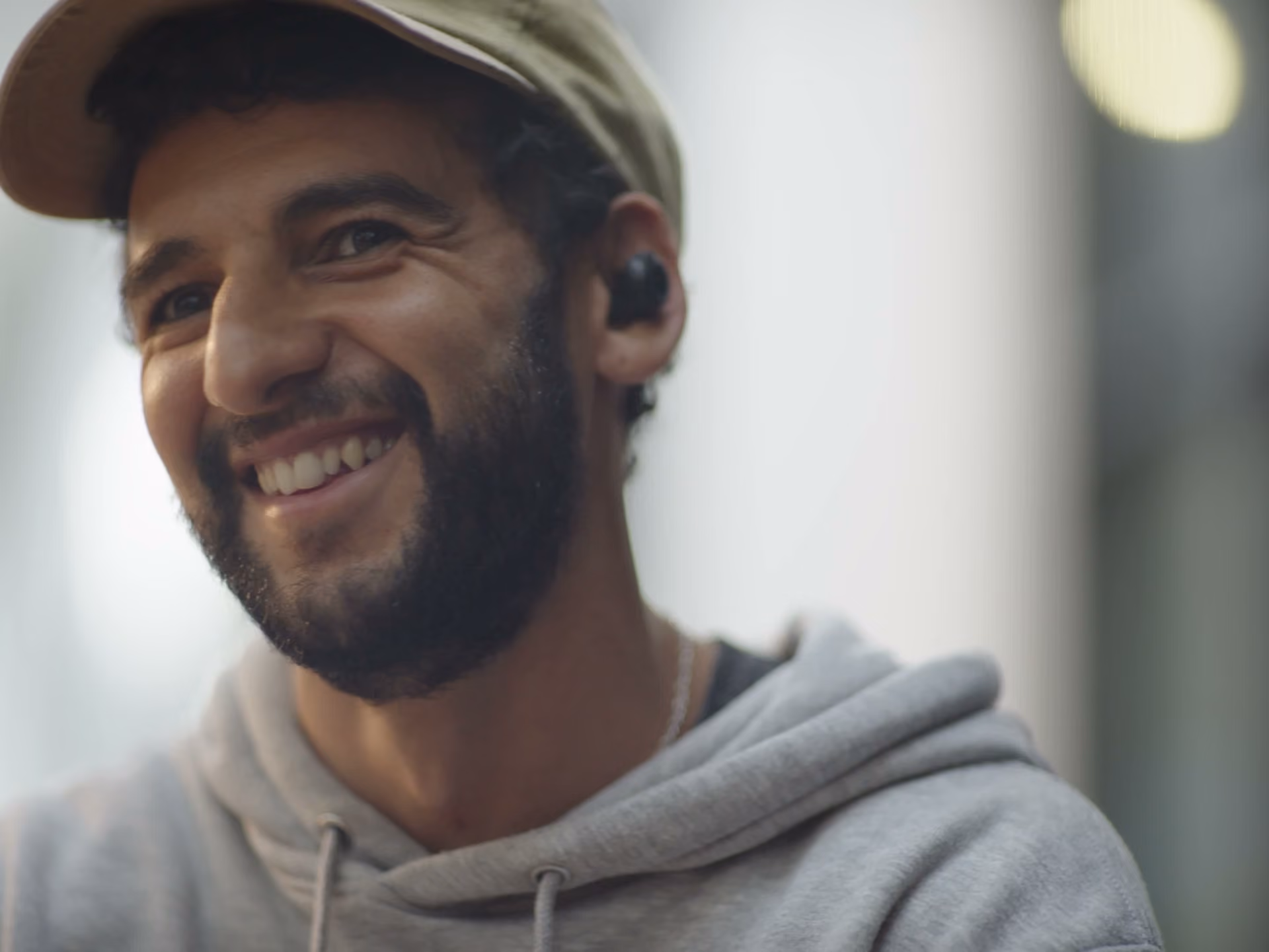 Man with headphones smiling