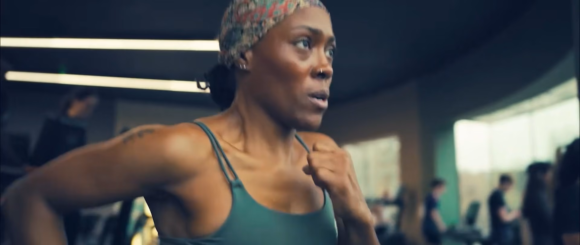 Woman running on a treadmill.