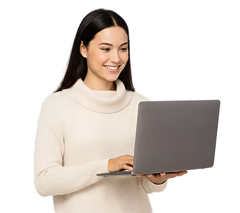 A woman is standing with holding the laptop