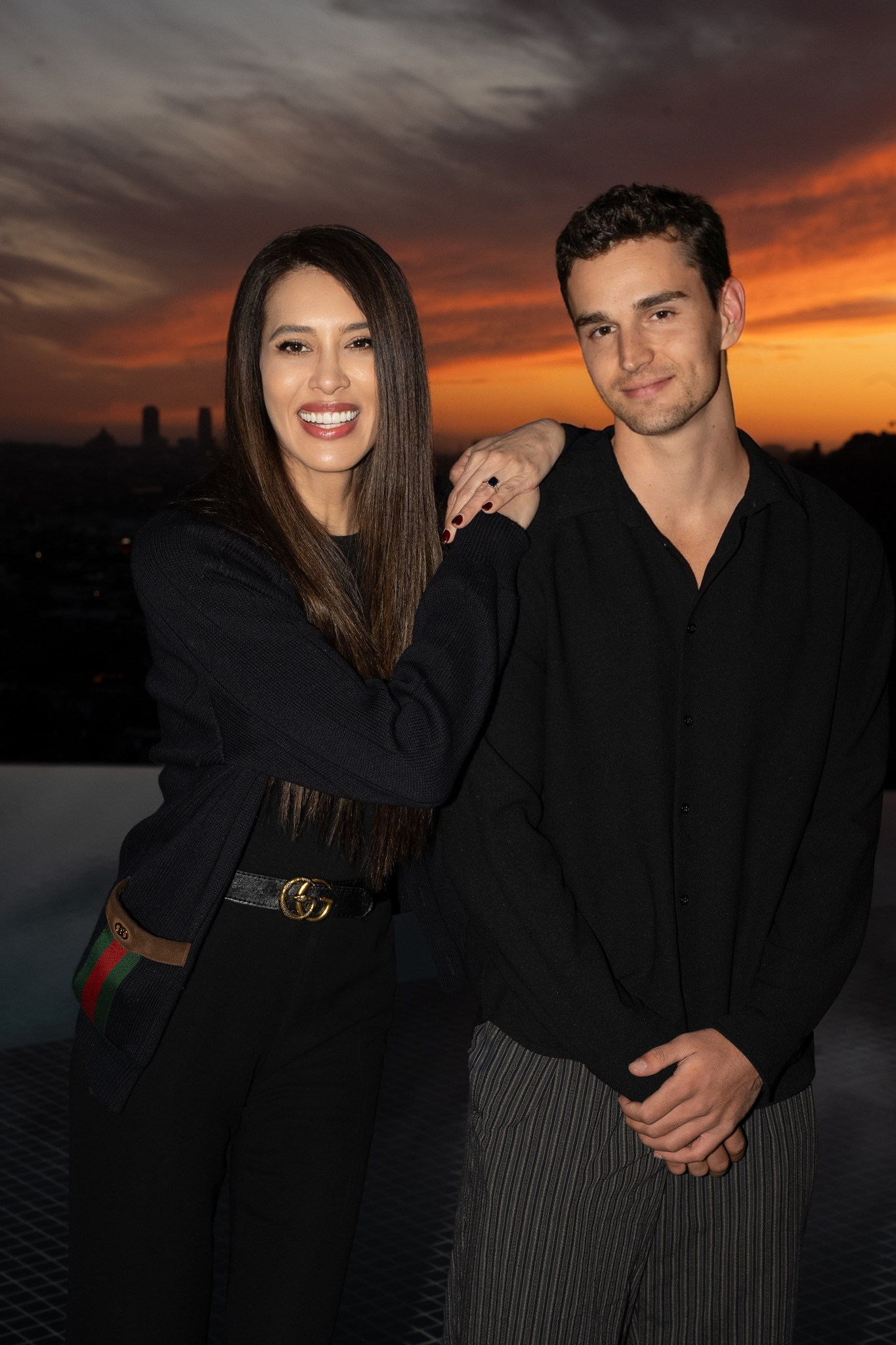 Trevor and Rochelle on a rooftop overlooking Los Angeles