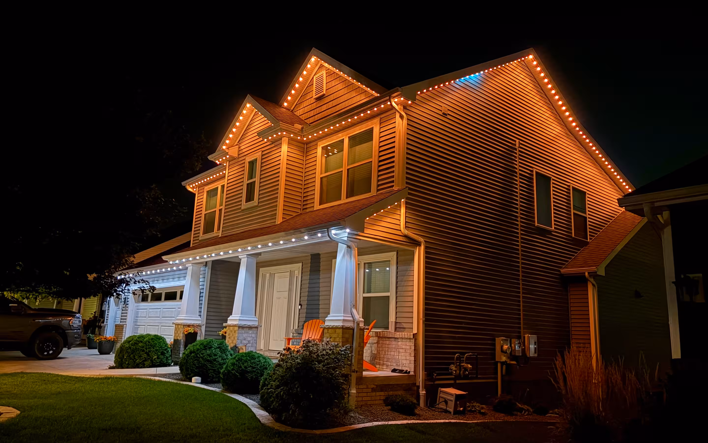 Halloween lighting installed on home with Manta Permanent Lighting system