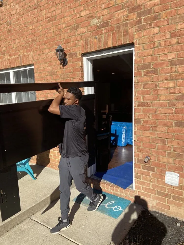 image of moving crew with equipment