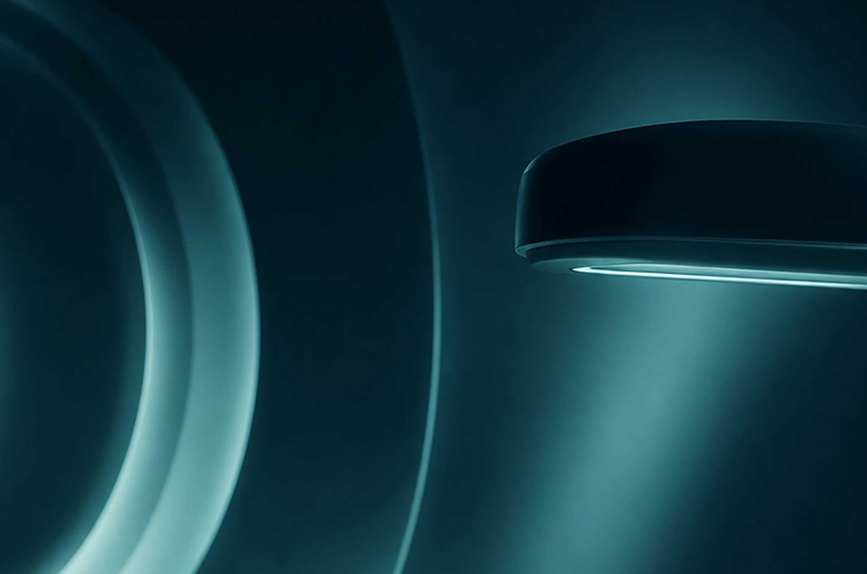 Abstract teal and blue curved architectural elements lit by soft ambient lighting