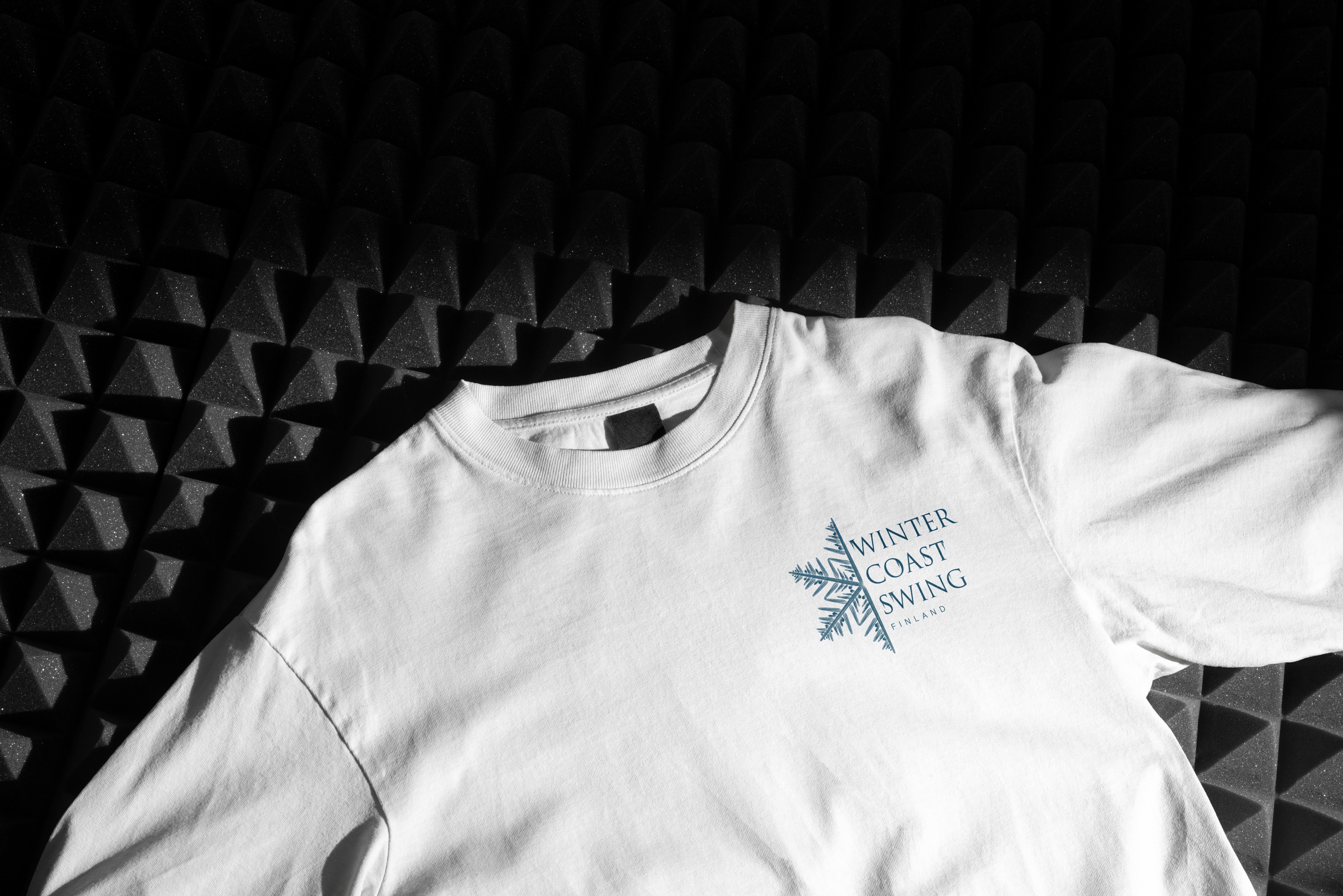 Winter Coast Swing secondary lockup on a white T-shirt