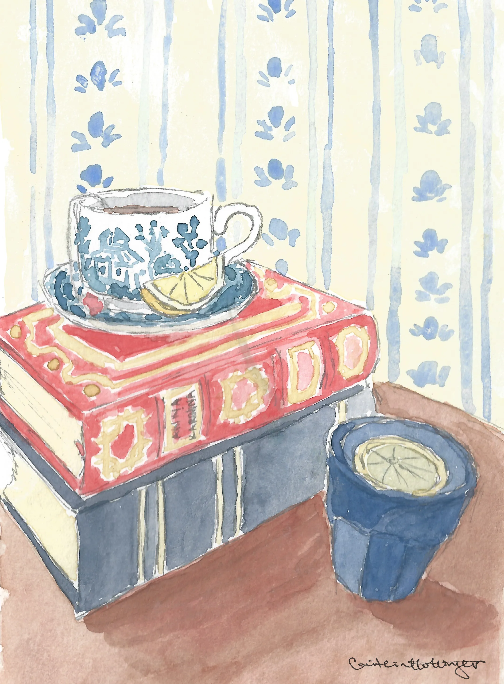 Watercolor painting of two stacked books with ornate covers, a tea cup with blue floral patterns and a lemon slice on top, and a blue cup with lemon slice on a wooden surface against wallpaper with vertical blue lines and floral motifs.