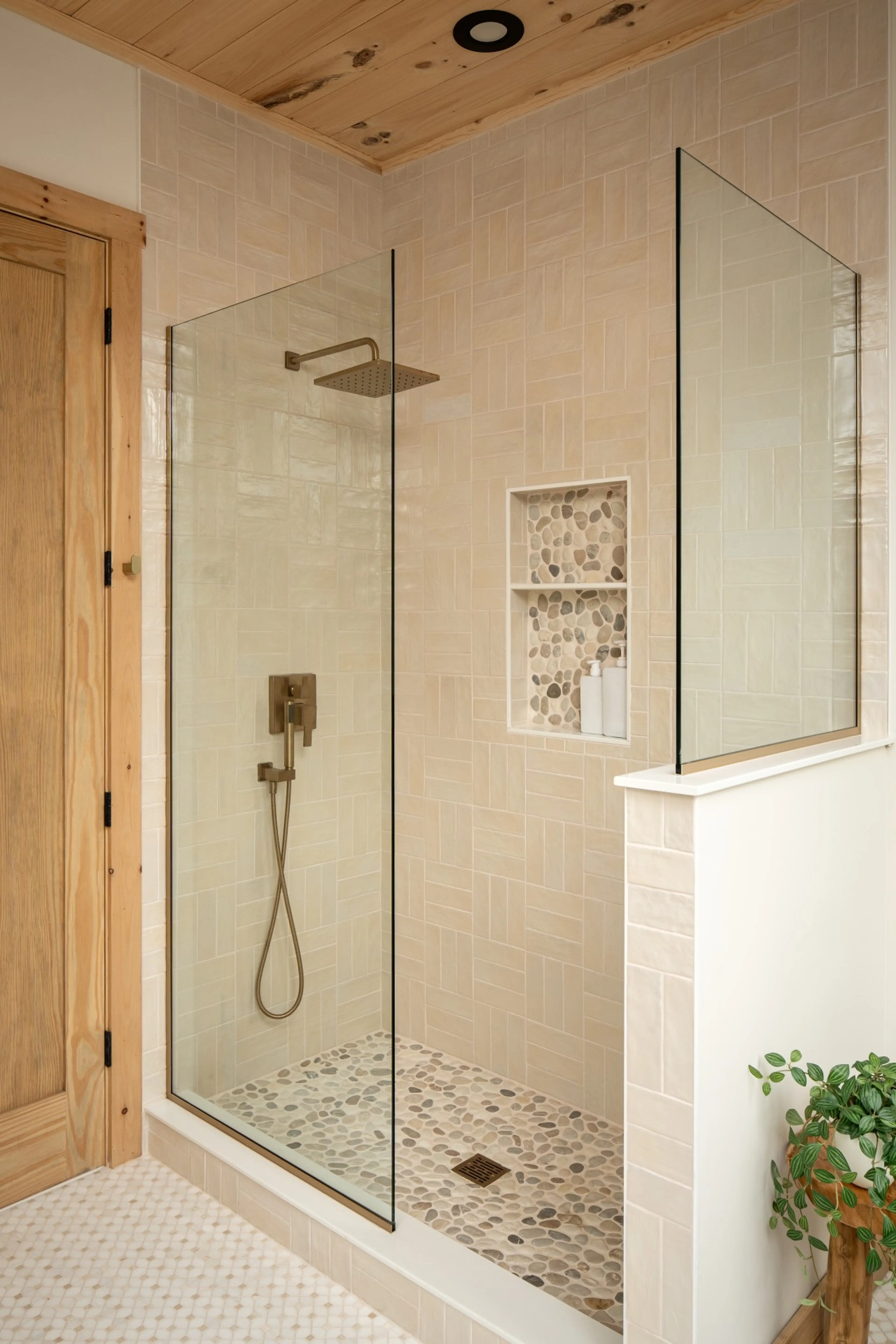 Walk-in shower with tile surround in a Solhaus Shenandoah bathroom