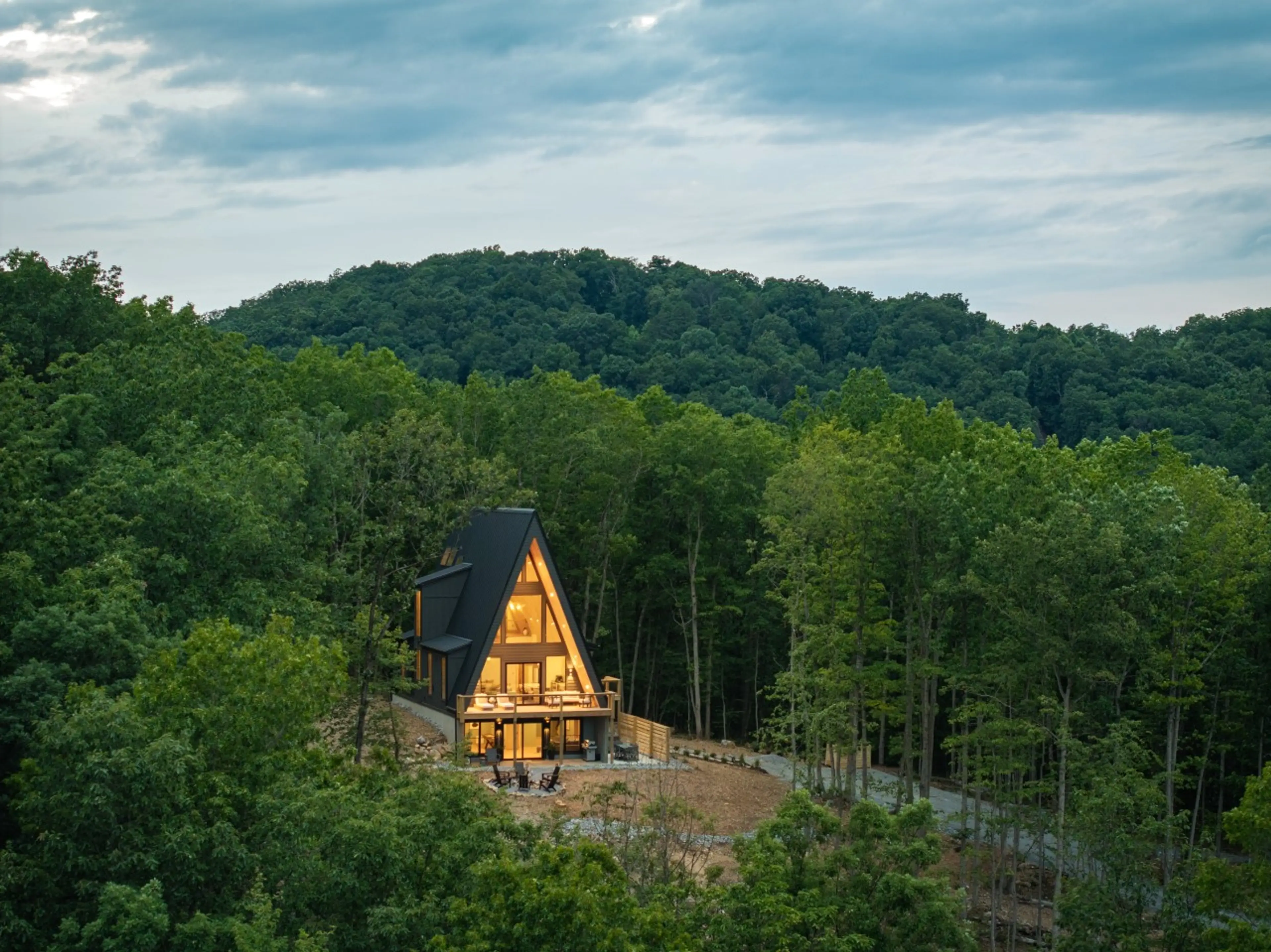 Aerial view of Solhaus Shenandoah surrounded by dense Blue Ridge Mountains forest