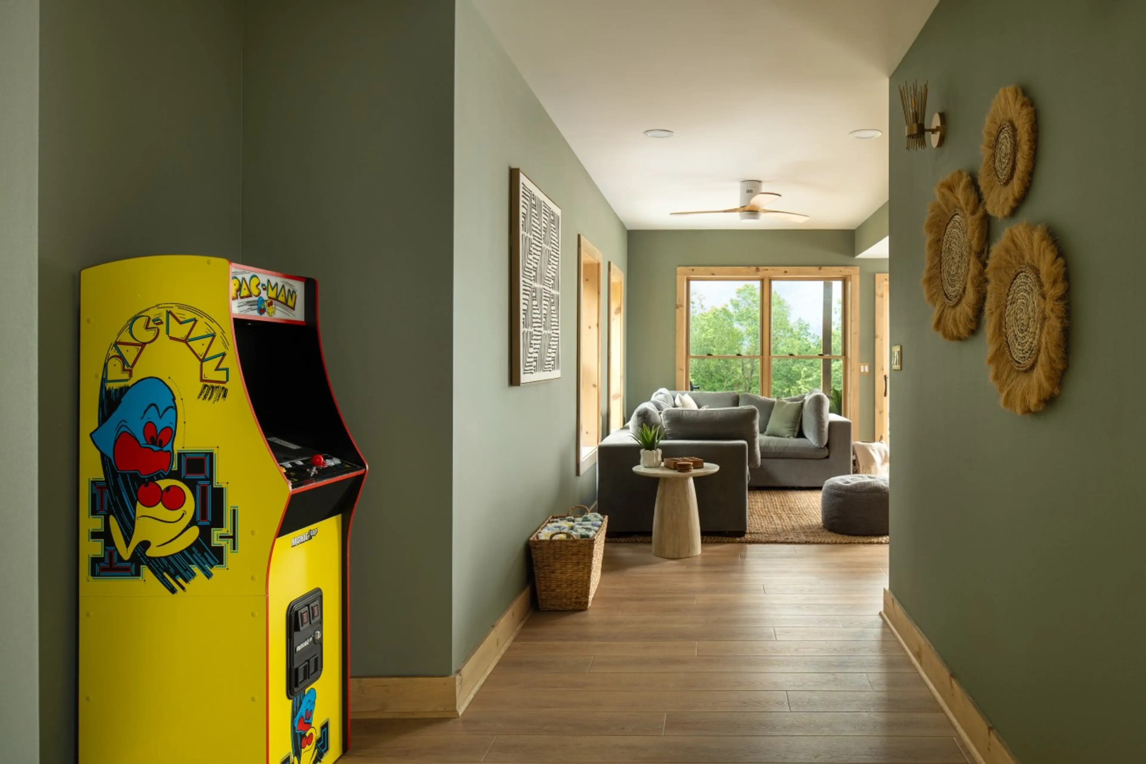 Retro arcade cabinet in the hallway at Solhaus Shenandoah