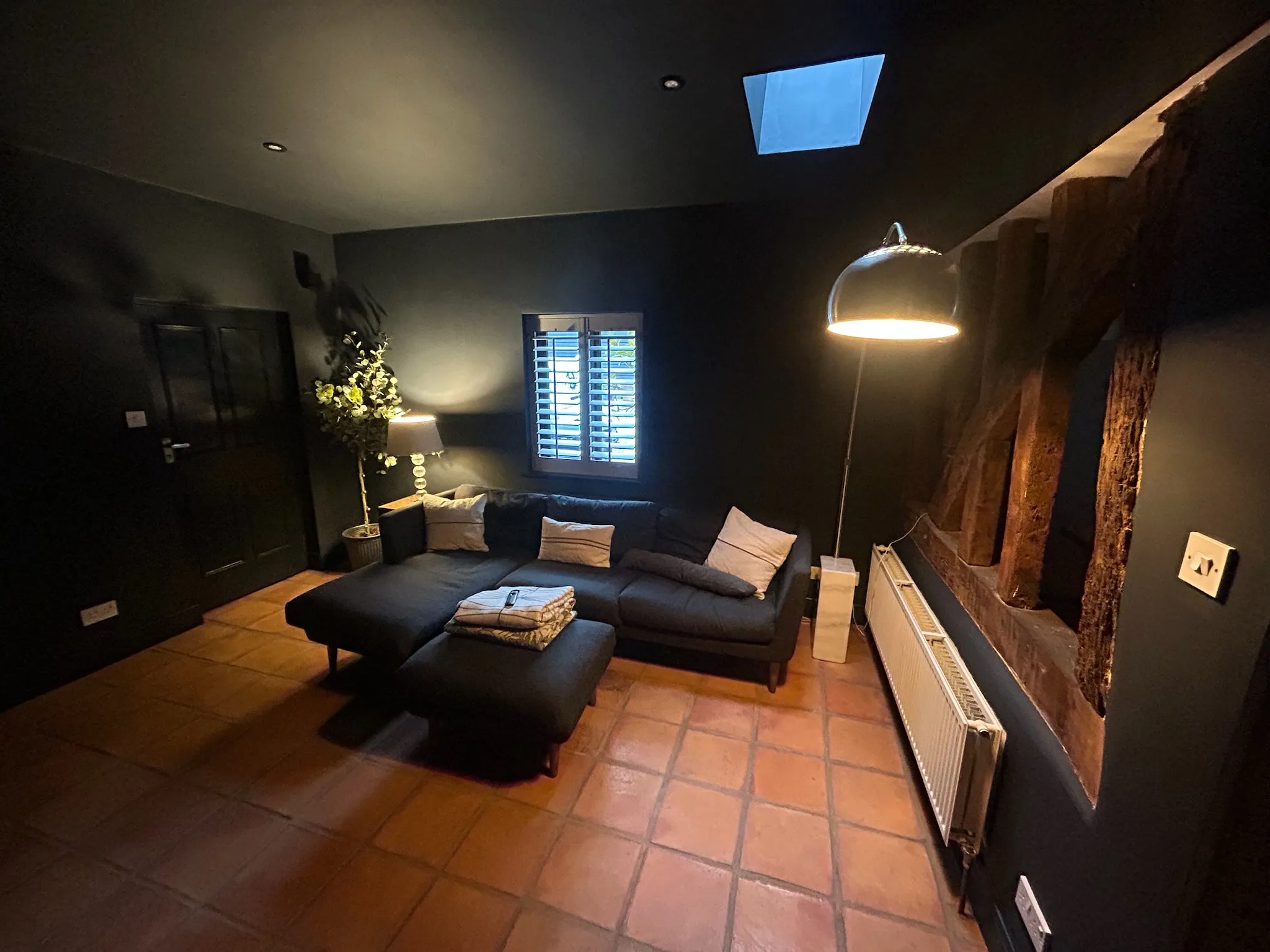 Refurbished room with black walls
