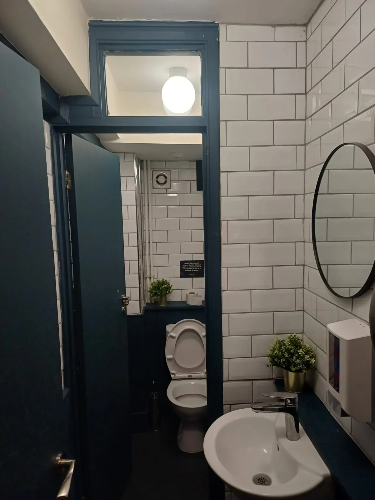 White tiling in new bathroom