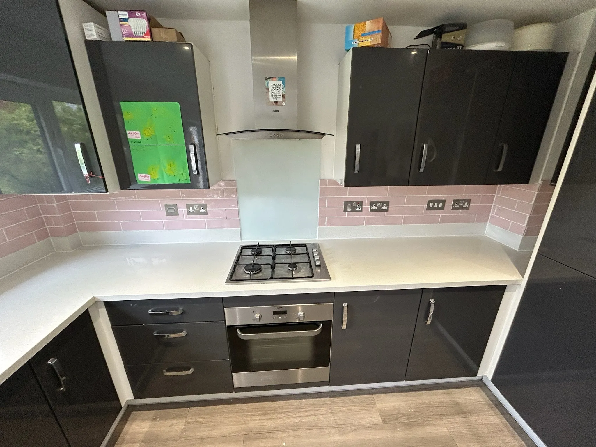 Kitchen with pink tiling