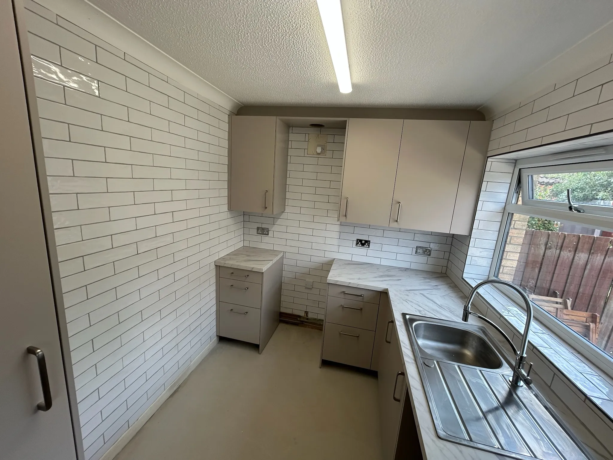 White tiled kitchen