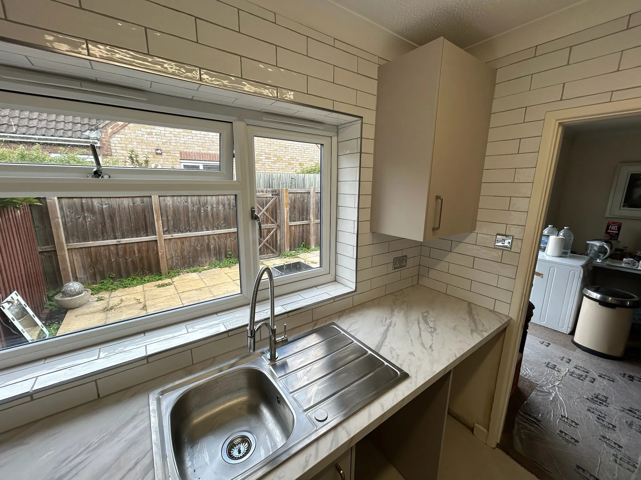 White tiled kitchen