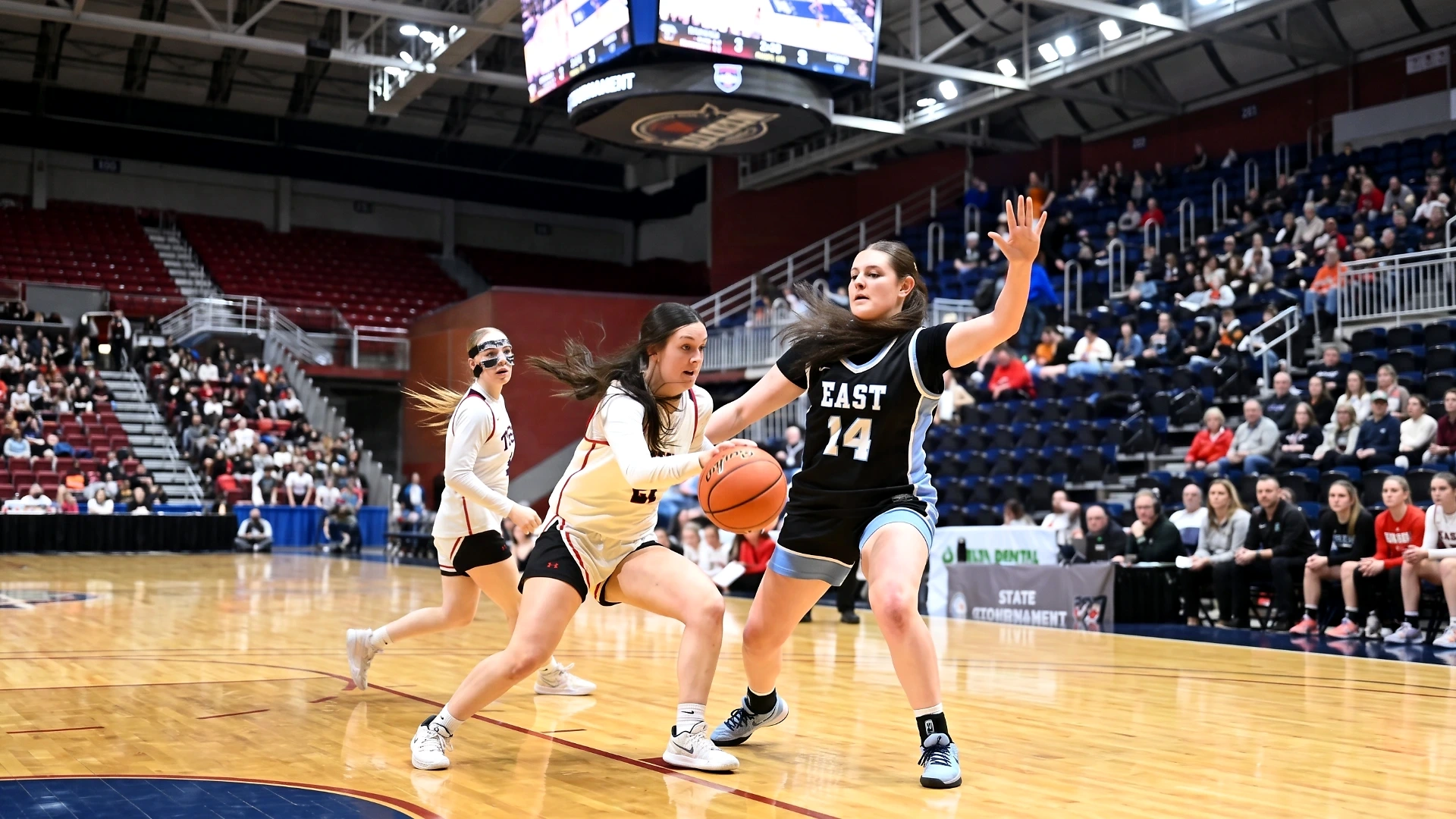 Girls basketball player driving to the hoop, representing Lumen Athletics sports performance in Cheyenne, WY.