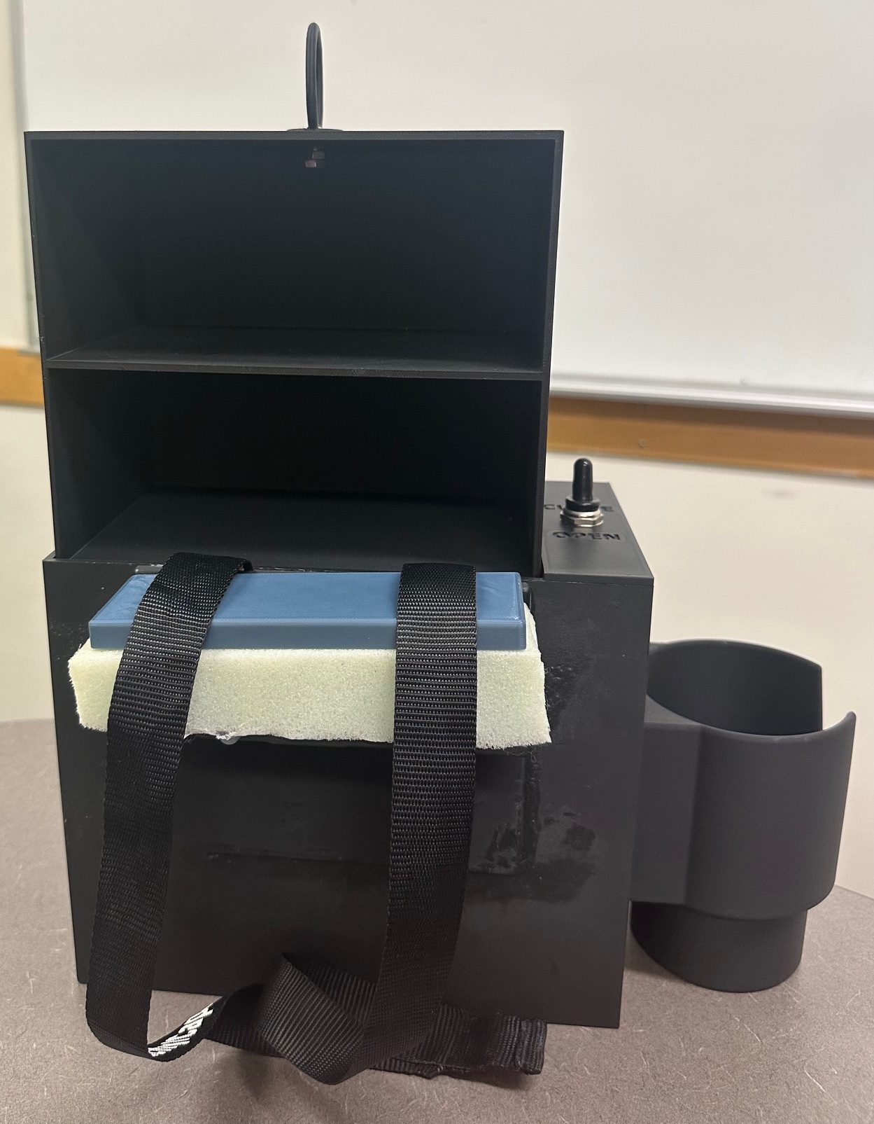 Final Lift Locker open with foam spacer, straps and cupholder