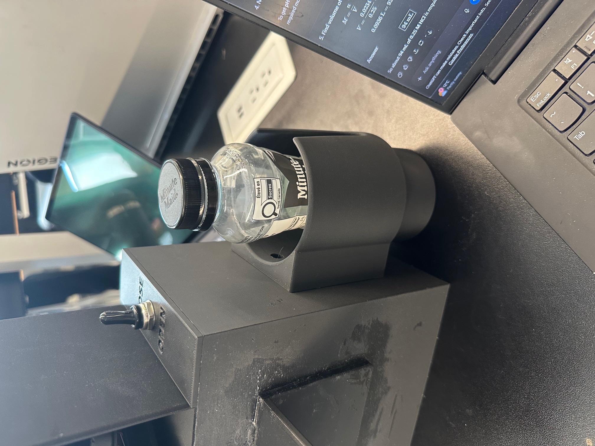 Cupholder holding a water bottle