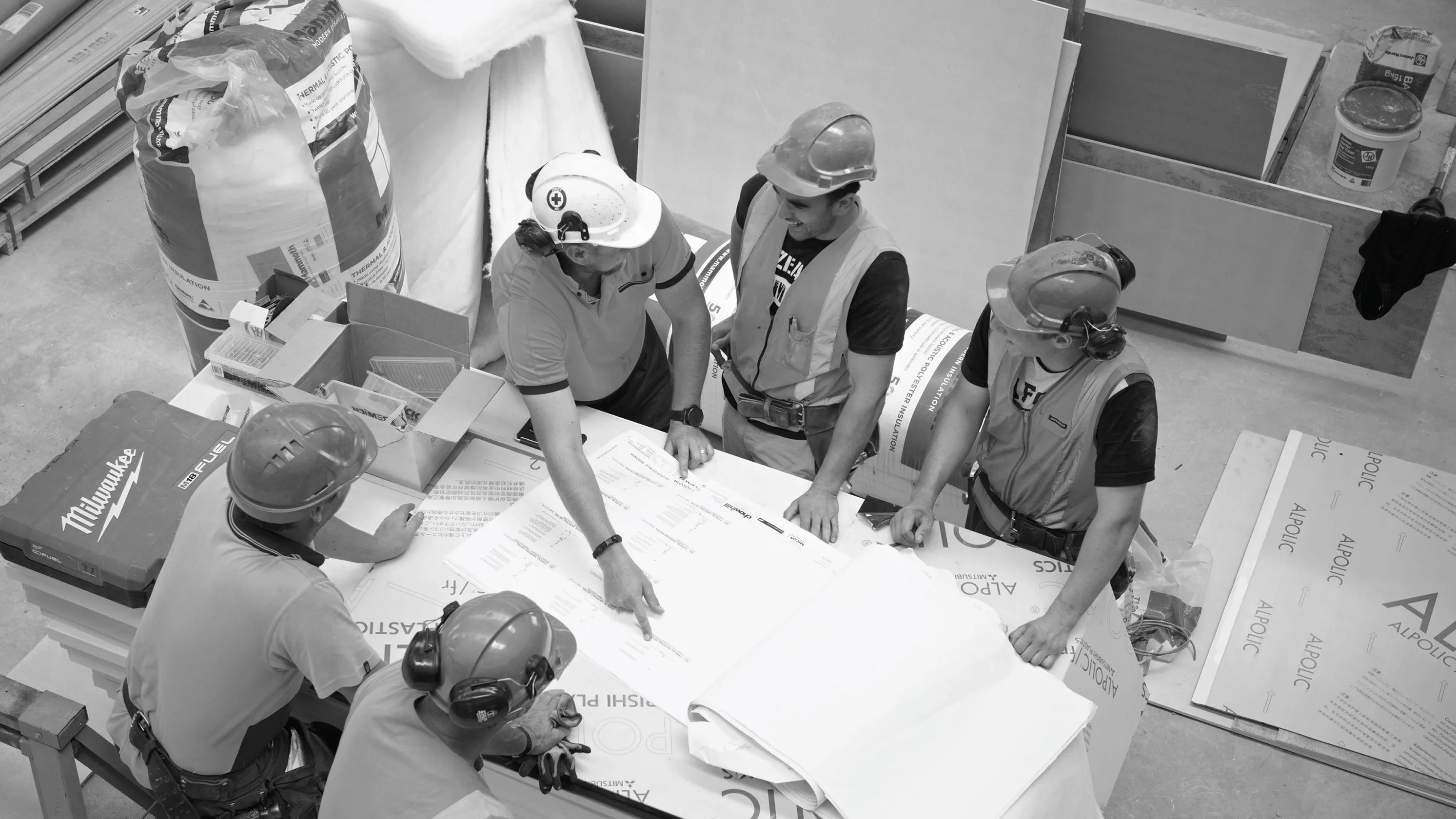 construction workers in a meeting