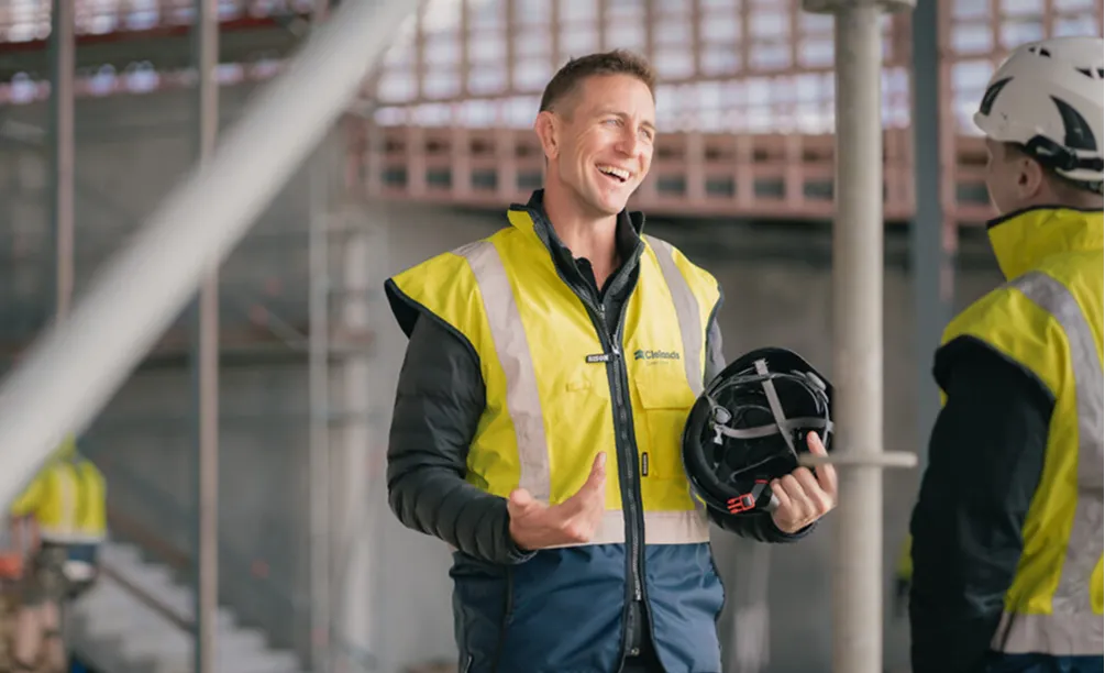 Clelands builders in hi-vis jackets