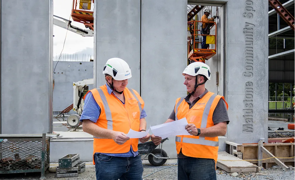 Maycroft builders in hi-vis jackets