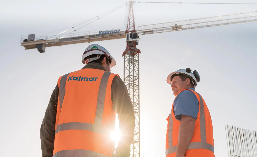 Kalmar builders in high-vis jackets