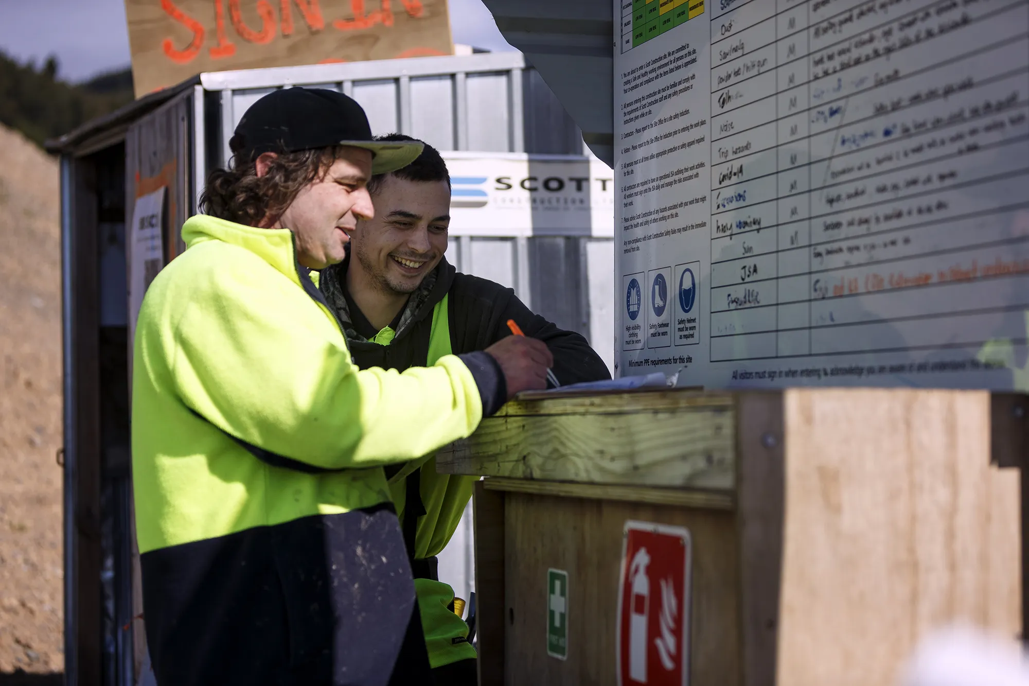Scott builders in hi-vis jackets