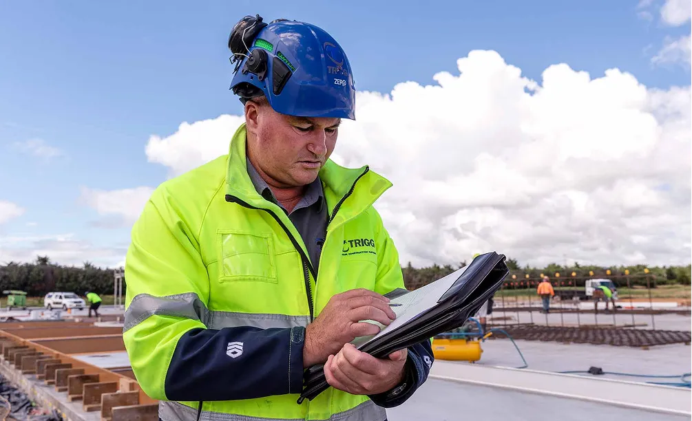Trigg construction builders in hi-vis jackets