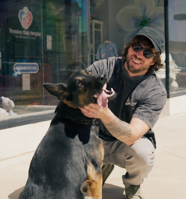 Alex Bois, CPI owner and head trainer, with a protection dog