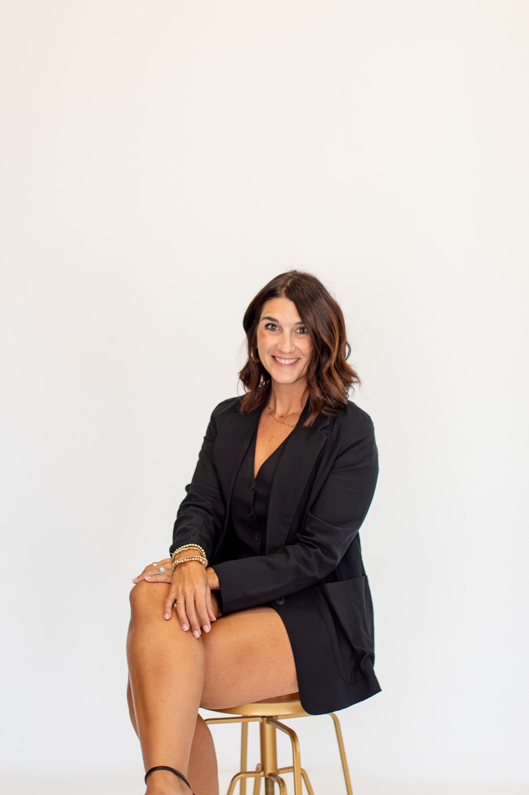 Brenna Barnhill seated in the Flourish studio