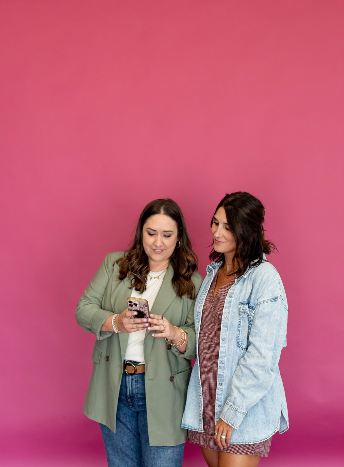 Brenna and Emily laughing between takes on set