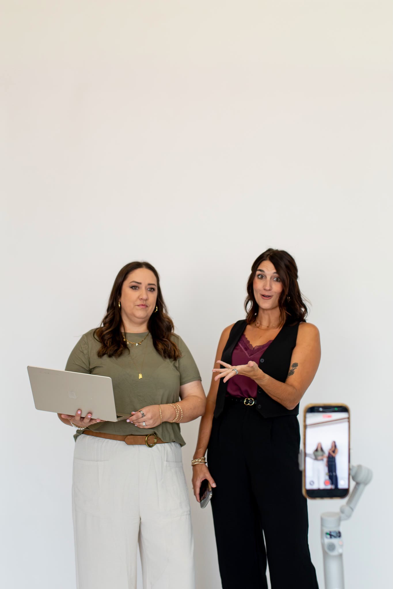 Brenna and Emily on a client call