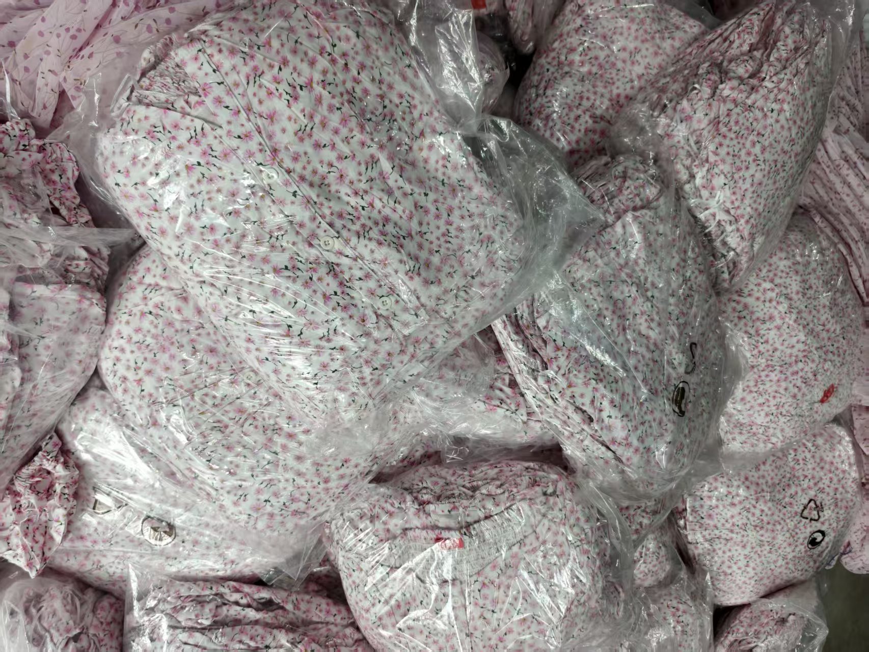 Close-up of 100% Viscose fabric texture and seam detail on Pink Ladies' Dress (Style No. TF9142)