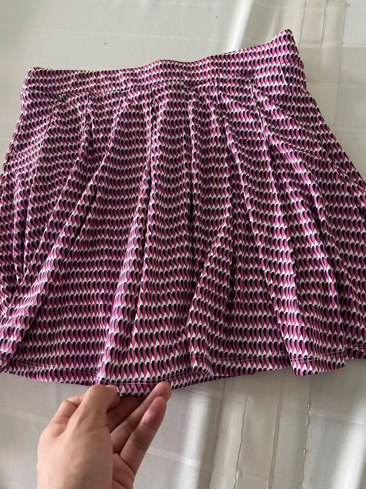 Back view and silhouette detail of Hot Pink Ladies' Skort (Style No. TF9143)
