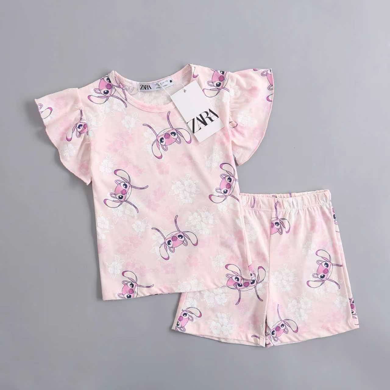 Pink patterned kids sleepwear set with short sleeve top and shorts