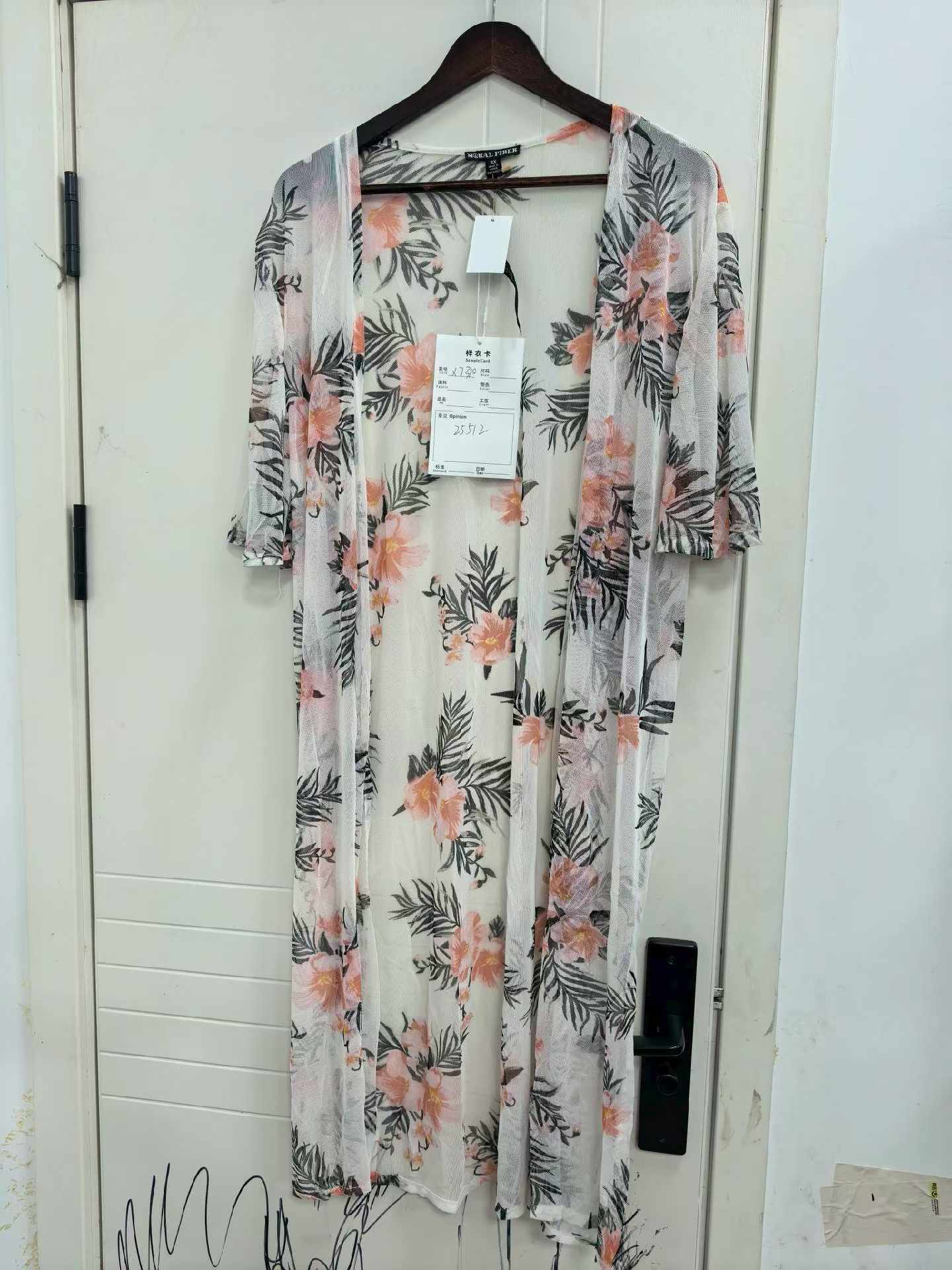 Ladies' floral print kimono cardigan displayed on a mannequin