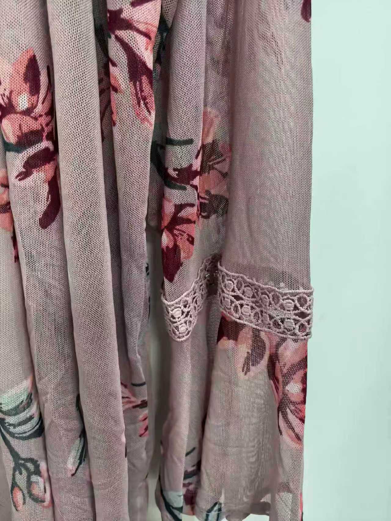 Pink floral print ladies' kimono cardigan displayed on a mannequin