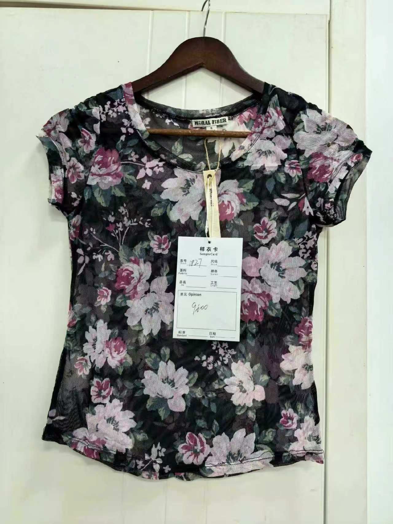 Ladies' short sleeve printed blouse displayed flat