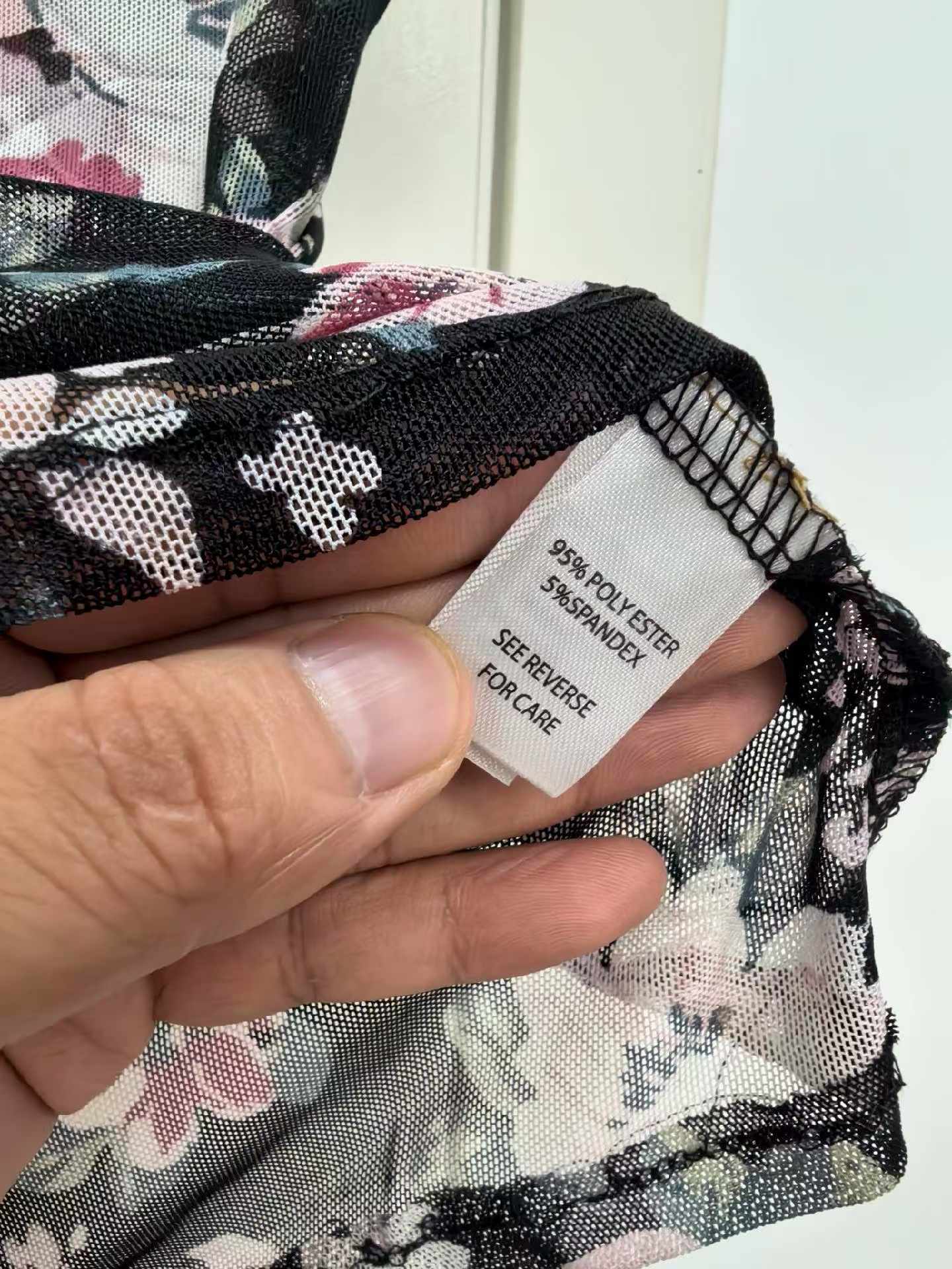 Close-up detail of ladies' printed blouse fabric and pattern