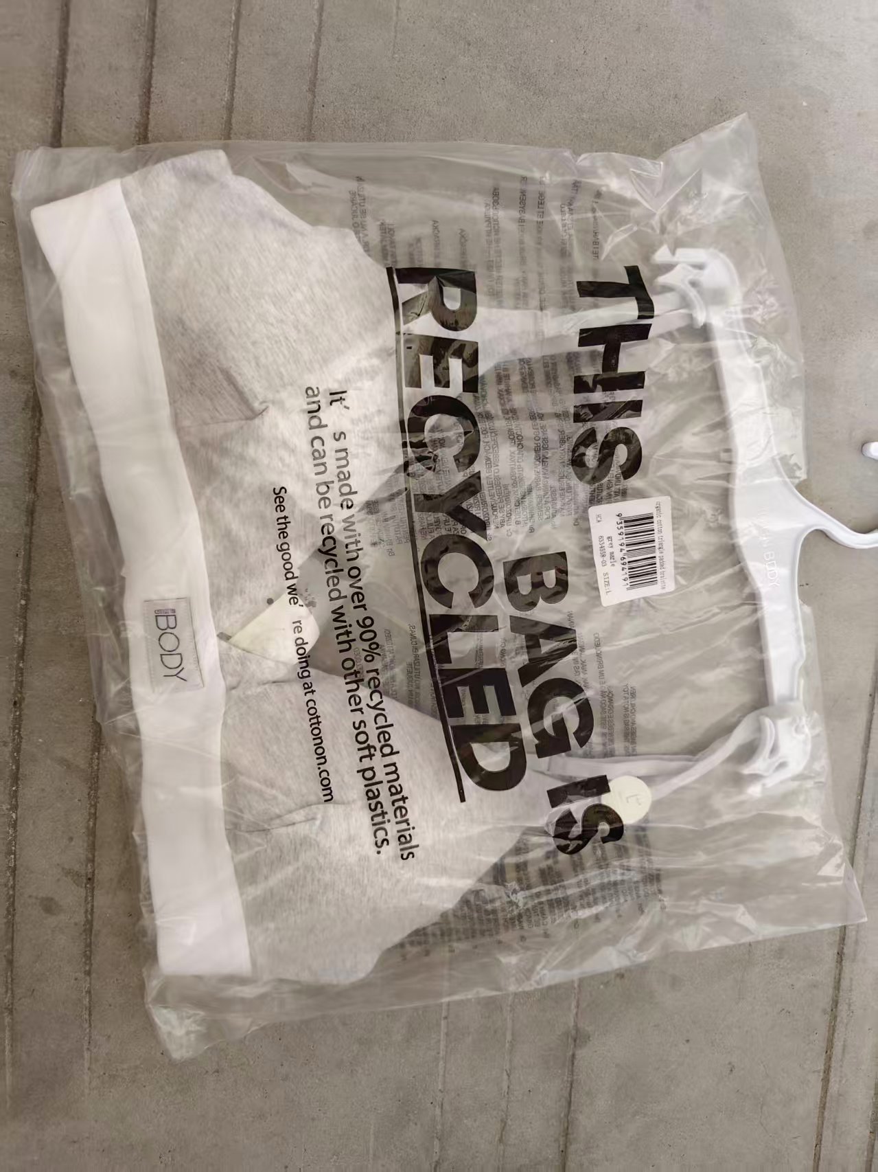 Close-up view of ladies' bra packed in recycled polybag packaging