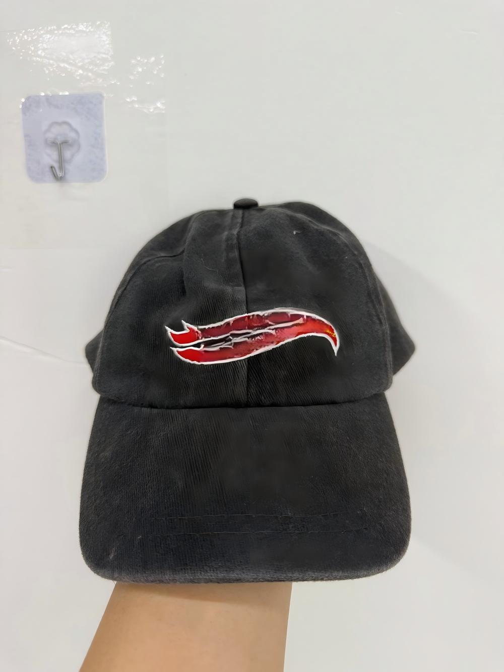 Black boy's baseball cap displayed on a mannequin head