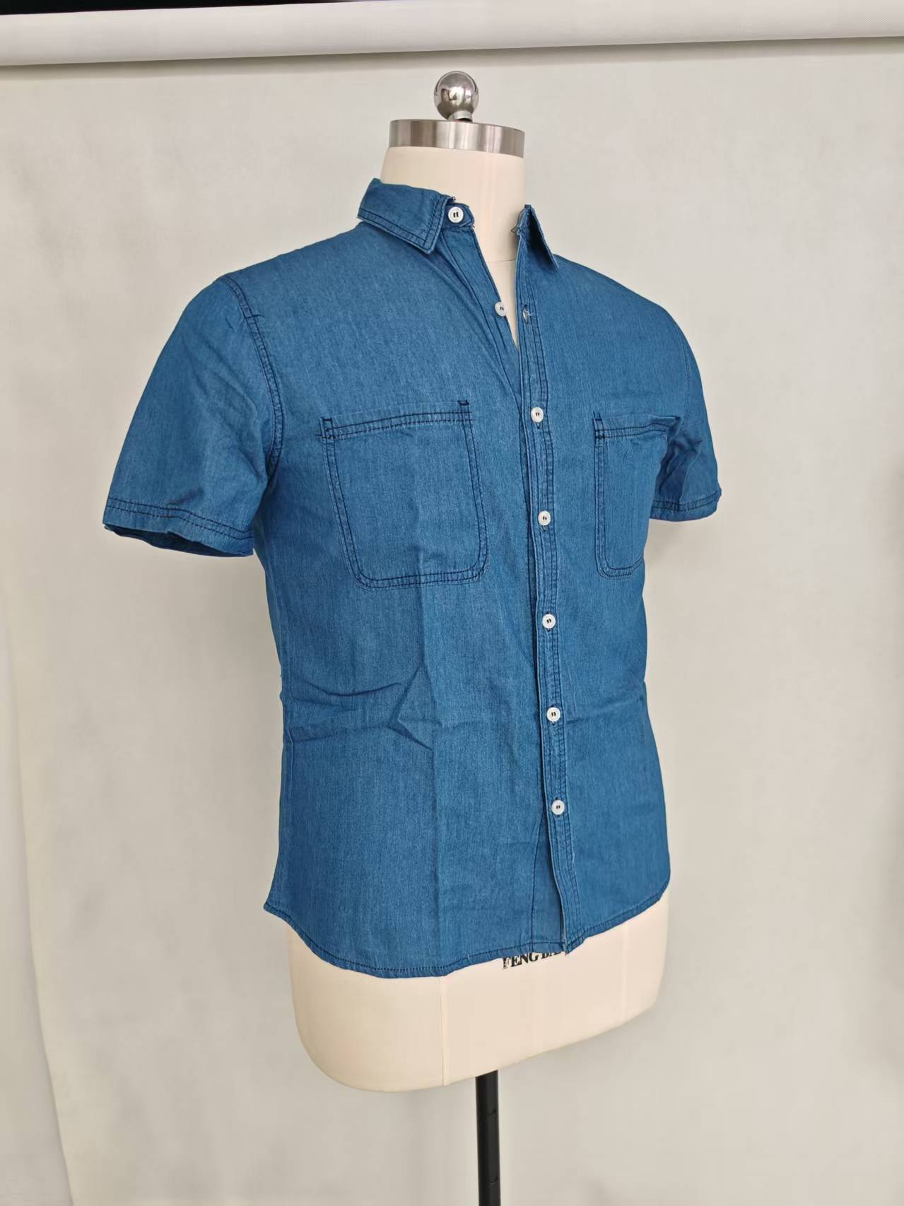 Light blue men's short sleeve cotton shirt displayed on a mannequin