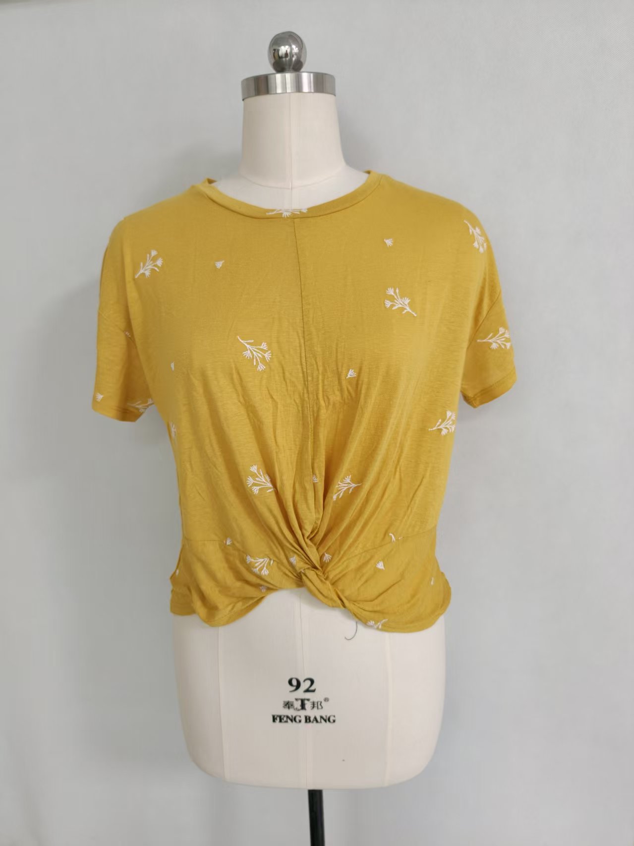 Mustard yellow ladies' short sleeve t-shirt displayed flat