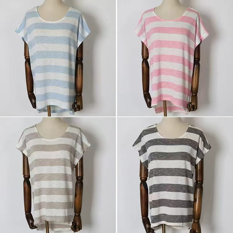 Ladies' short sleeve t-shirts displayed together in multiple colors on clothes hangers