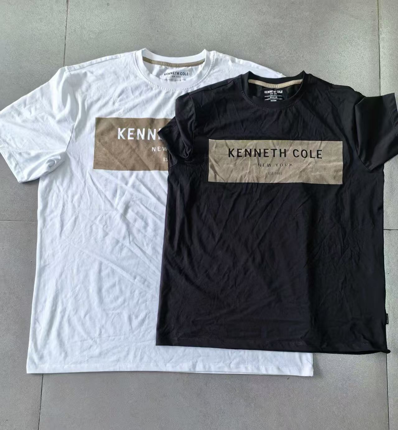 Men's short sleeve cotton t-shirts displayed together in black and white flat