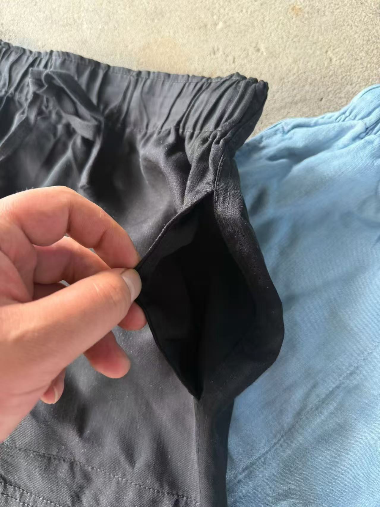 Close-up view of the light blue women's Tencel shorts showing side pocket details.