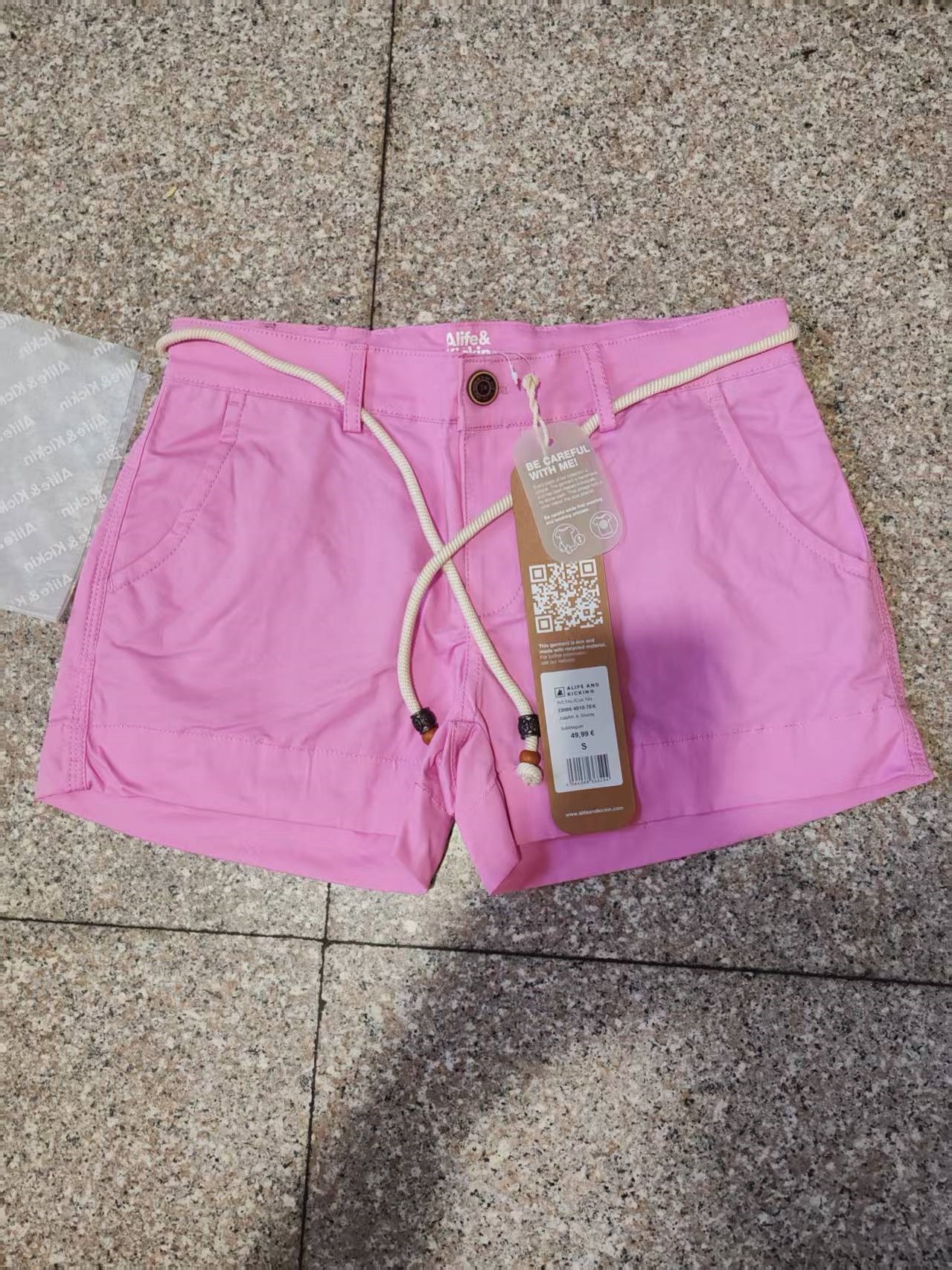 Women's casual shorts with drawstring waistband, featuring multiple colors including pink, khaki, black, and dusty rose.